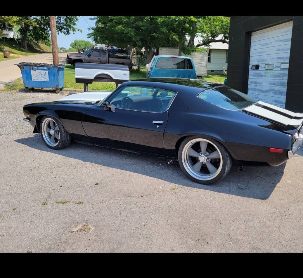 Classic muscle car finished in deep gloss black
